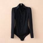 Black bodysuit on a beige background