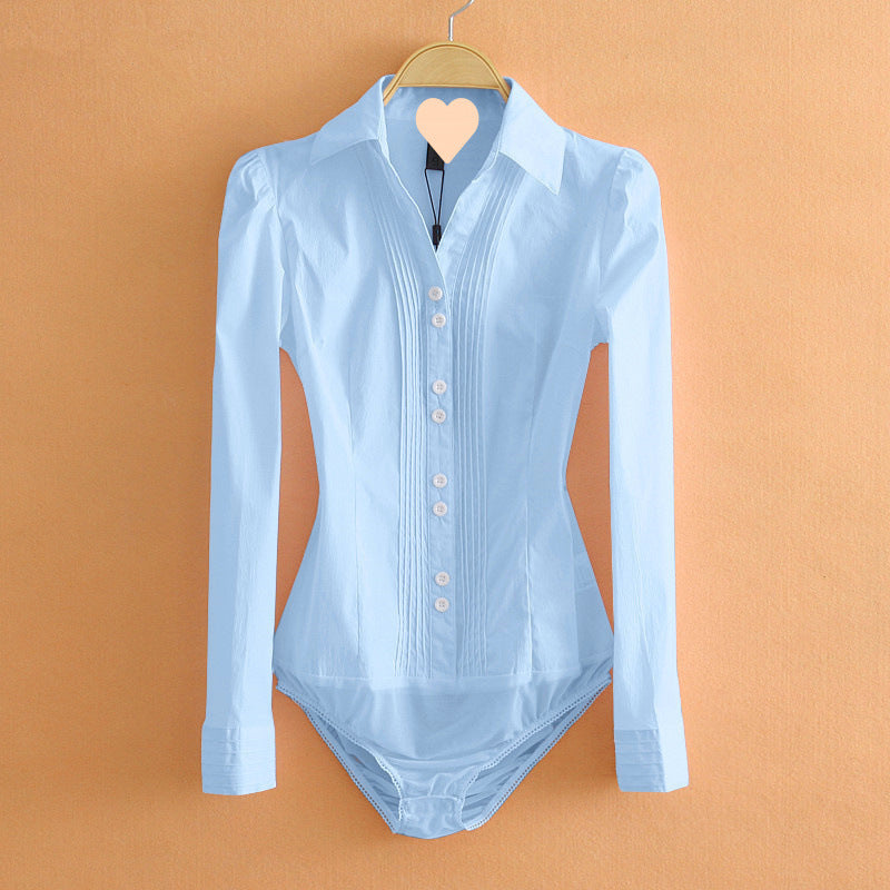 Light blue bodysuit with long sleeves on a hanger against an orange background