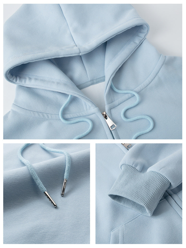 Light blue hoodie with close-up details on a white background