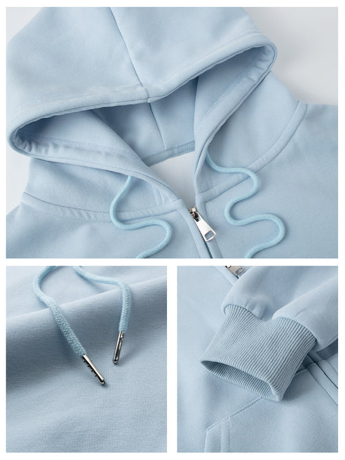 Light blue hoodie with close-up details on a white background