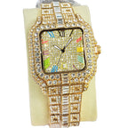 Luxury gold watch with gemstones on a light background