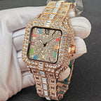 Luxury watch with rose gold case and diamond-studded face held by a gloved hand.
