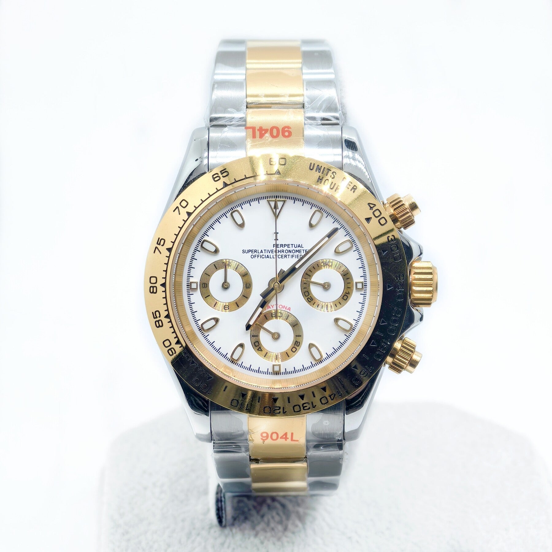 Luxury watch with silver and gold band on a white background
