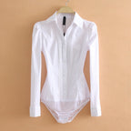 White bodysuit with long sleeves on a beige background
