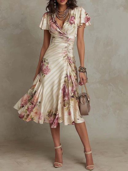 Woman wearing a floral dress with a neutral background
