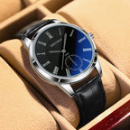 Wristwatch with black strap and blue dial on a beige surface
