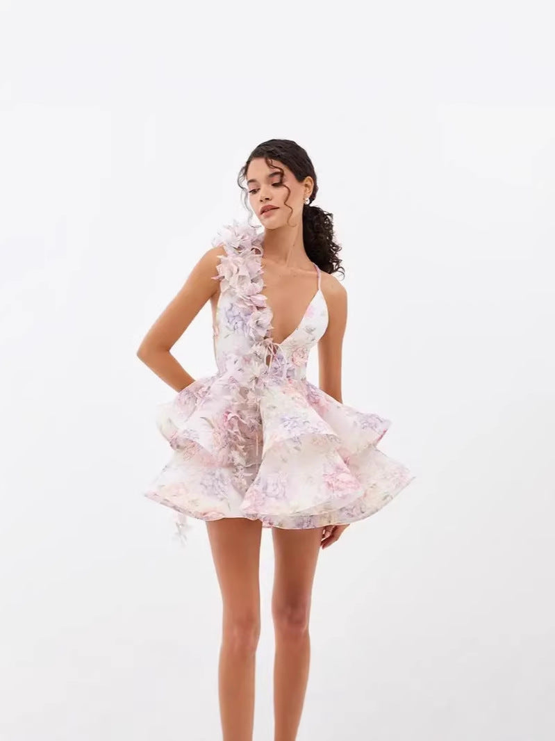 women dressed in a floral dress with grey in the background fashionvelvet
